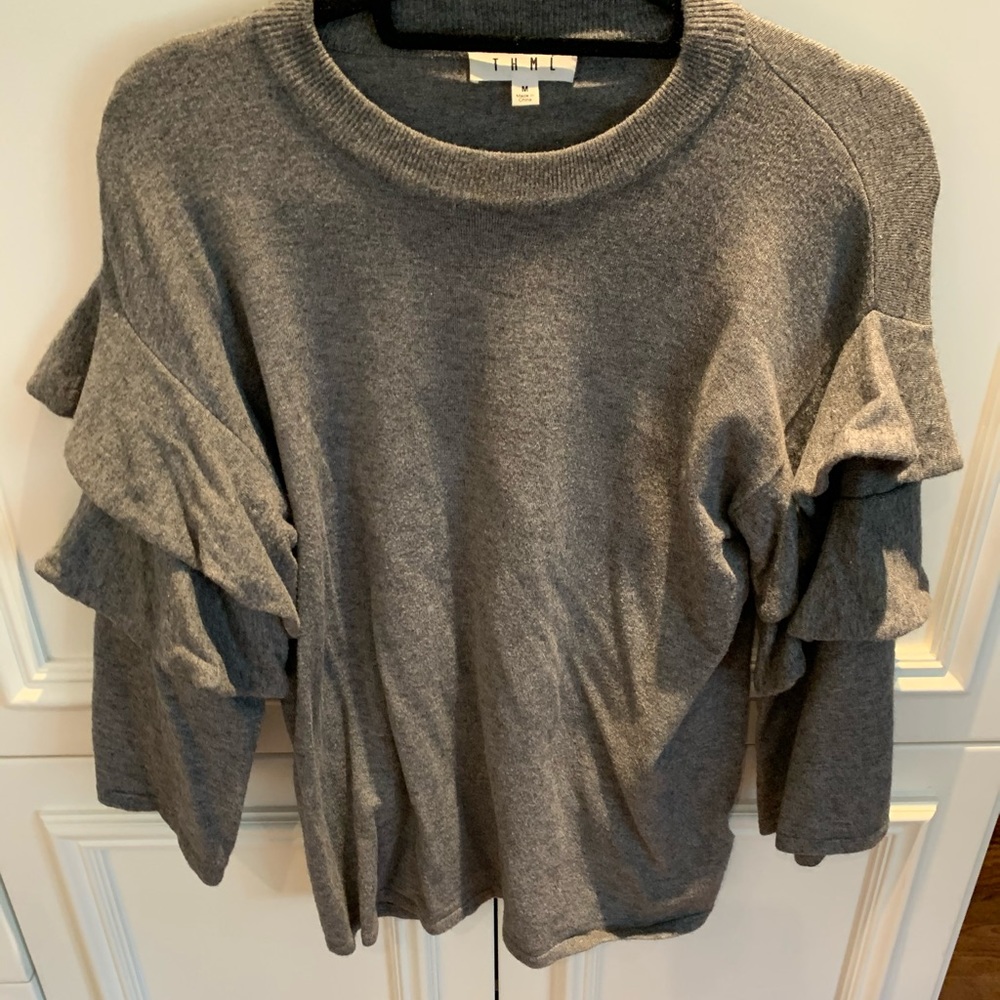 grey sweater with ruffles